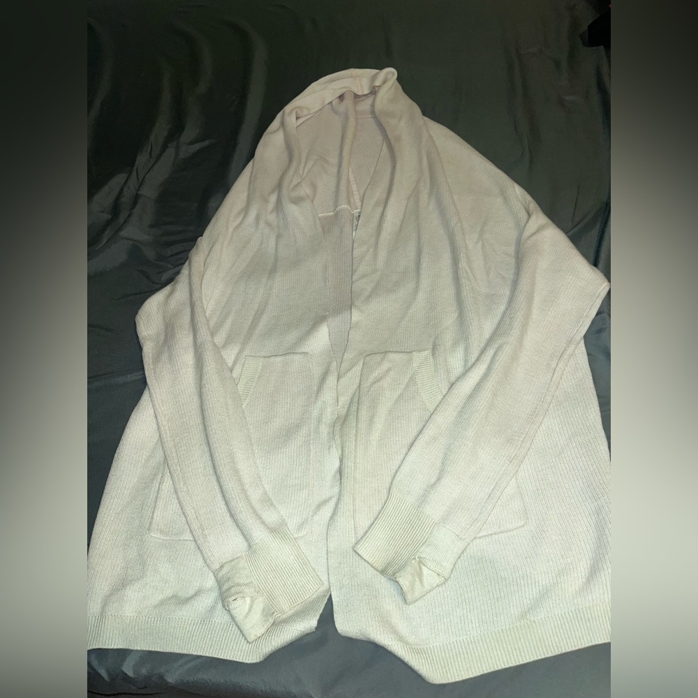 Very pale pink lululemon hooded cardigan sweater.